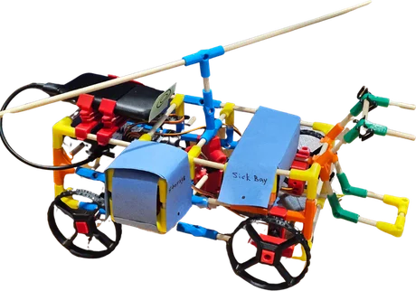 A buggy with a blue panel, black wheels and a long aerial