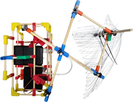 A machine with a black box and a white net on a frame