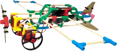 A low glider on wheels with green and blue wings